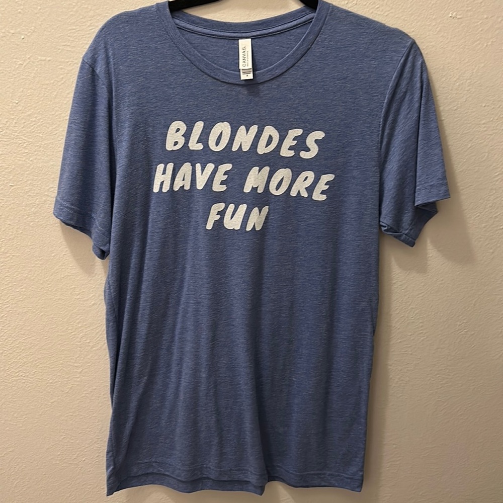 Medium soft shirt. Blondes have more fun. Never worn.